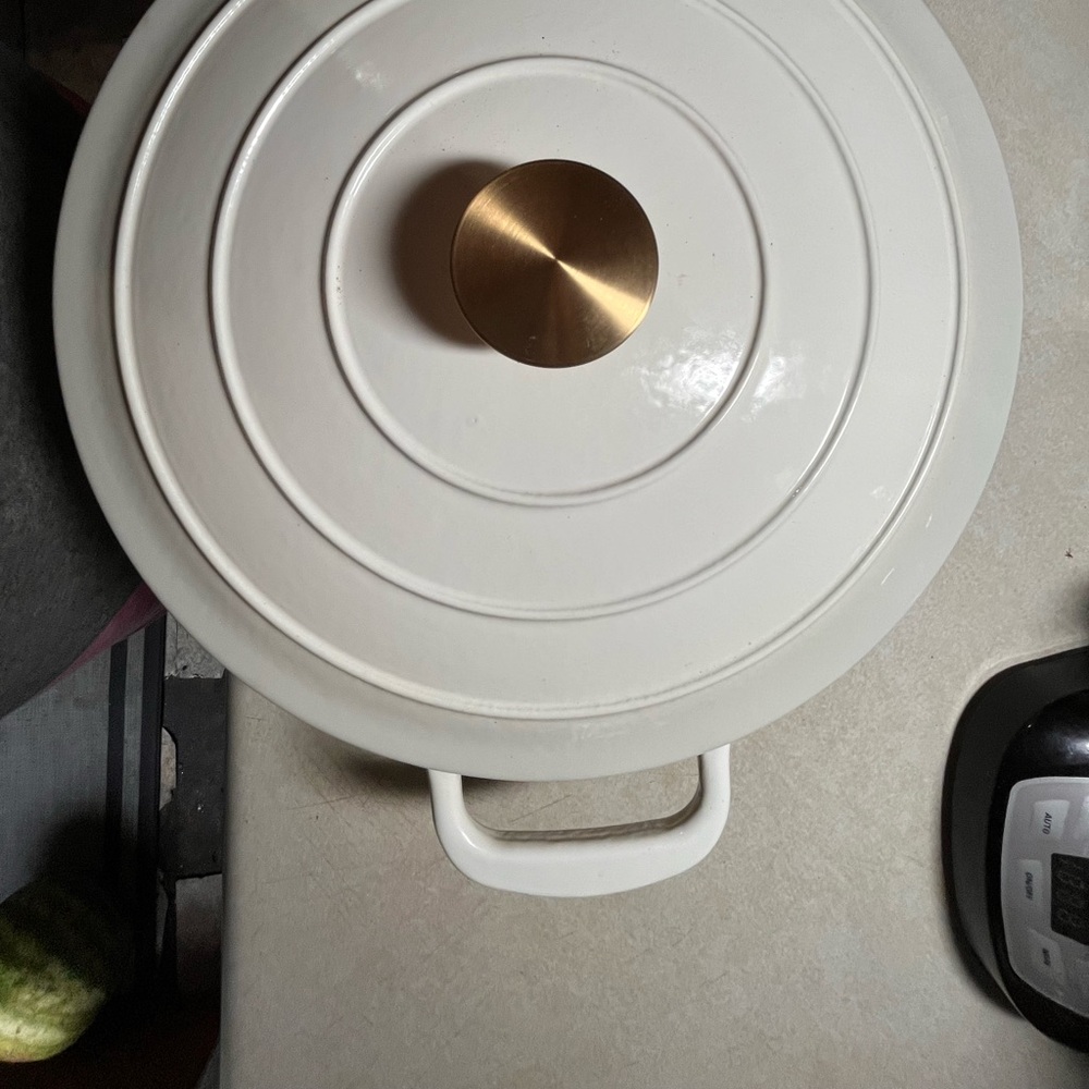 Elegant White Cookware with Gold Handle
